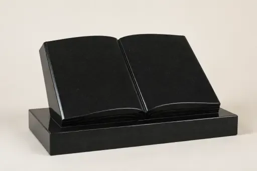 Горизонтальный памятник в форме раскрытой книги из светло-серого гранита